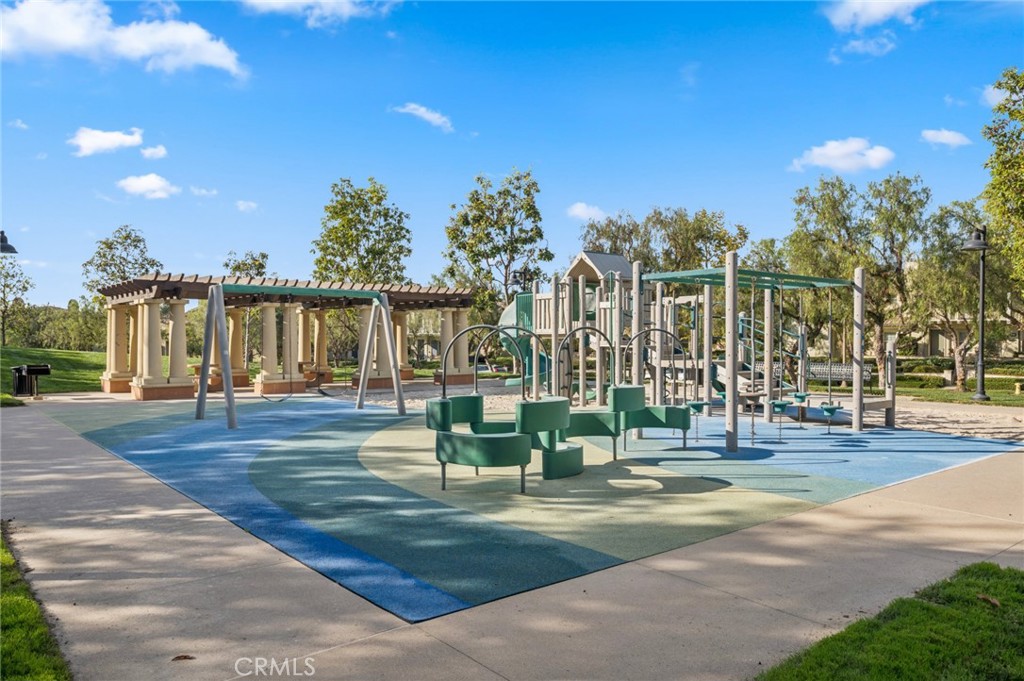 22 Ridge Valley Irvine, CA 92618 - Photo 30 of 37 a view of a water fountain and a big yard
