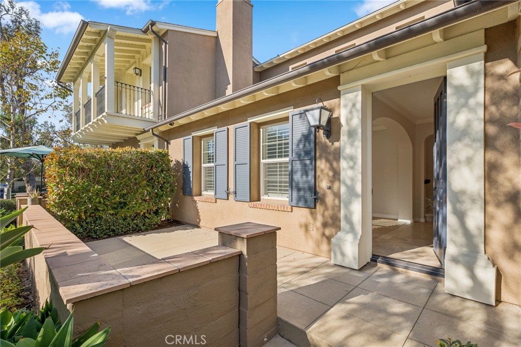 22 Ridge Valley Irvine, CA 92618 - Photo 3 of 37 a view of a brick house with a large windows