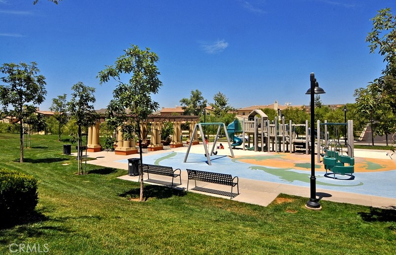 22 Ridge Valley Irvine, CA 92618 - Photo 34 of 37 a swimming pool with outdoor seating and yard