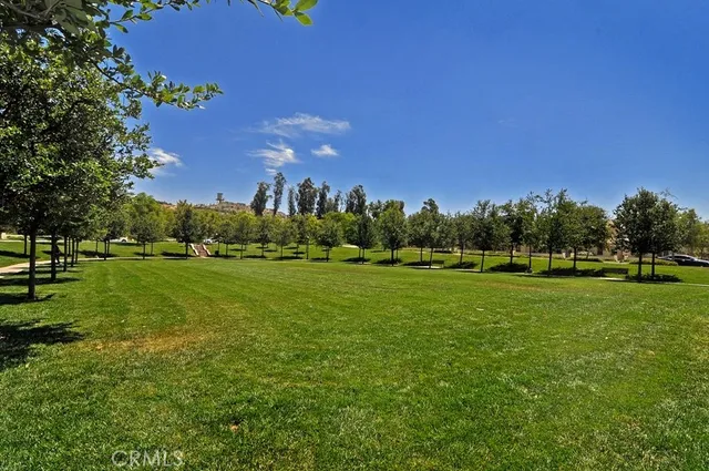 a view of field with green space