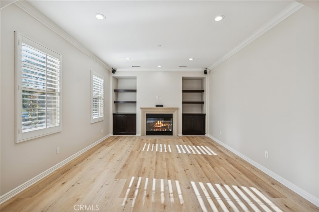 22 Ridge Valley Irvine, CA 92618 - Photo 5 of 37 a view of a room with a fireplace and window