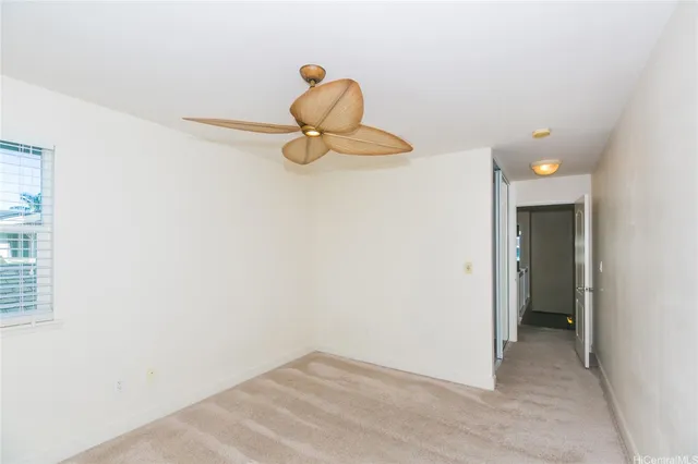 a view of a hallway with a white walls