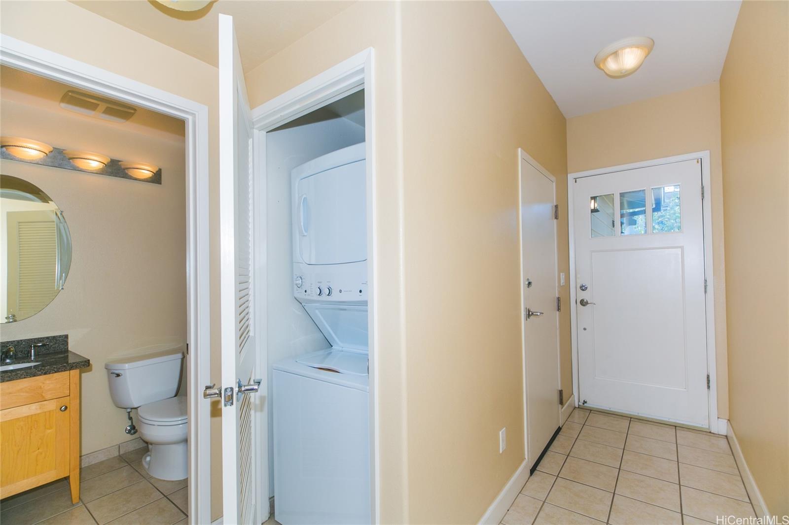 92-1516 Ali'inui Drive, Unit 1707 Kapolei, HI 96707 - Photo 20 of 23 a bathroom with a toilet and a shower
