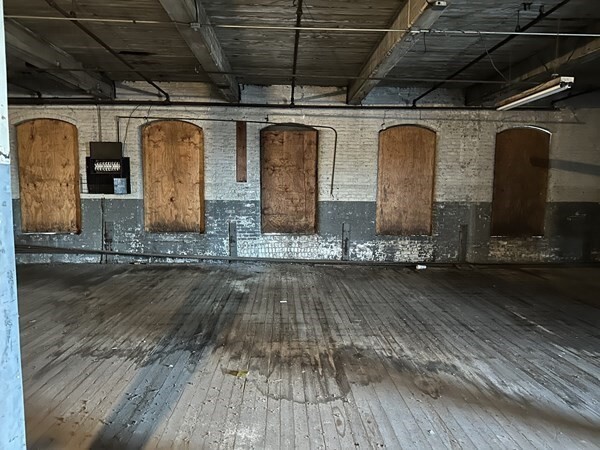 130 Middle Water Street Holyoke, MA 01040 - Photo 7 of 16 a view of garage with wooden floor