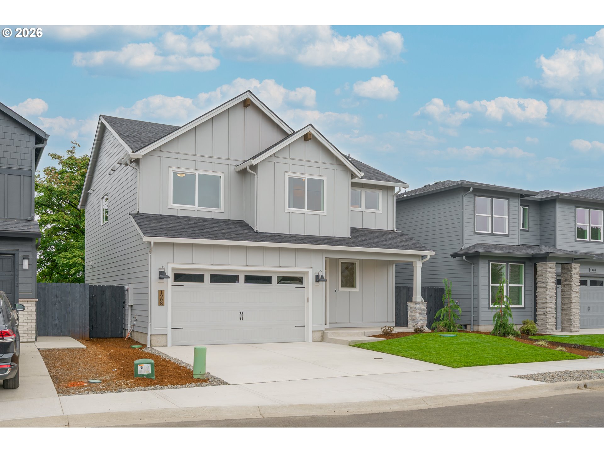 1908 Northwest 21st Circle Battle Ground, WA 98604 - Photo 2 of 40 a front view of a house with a garden