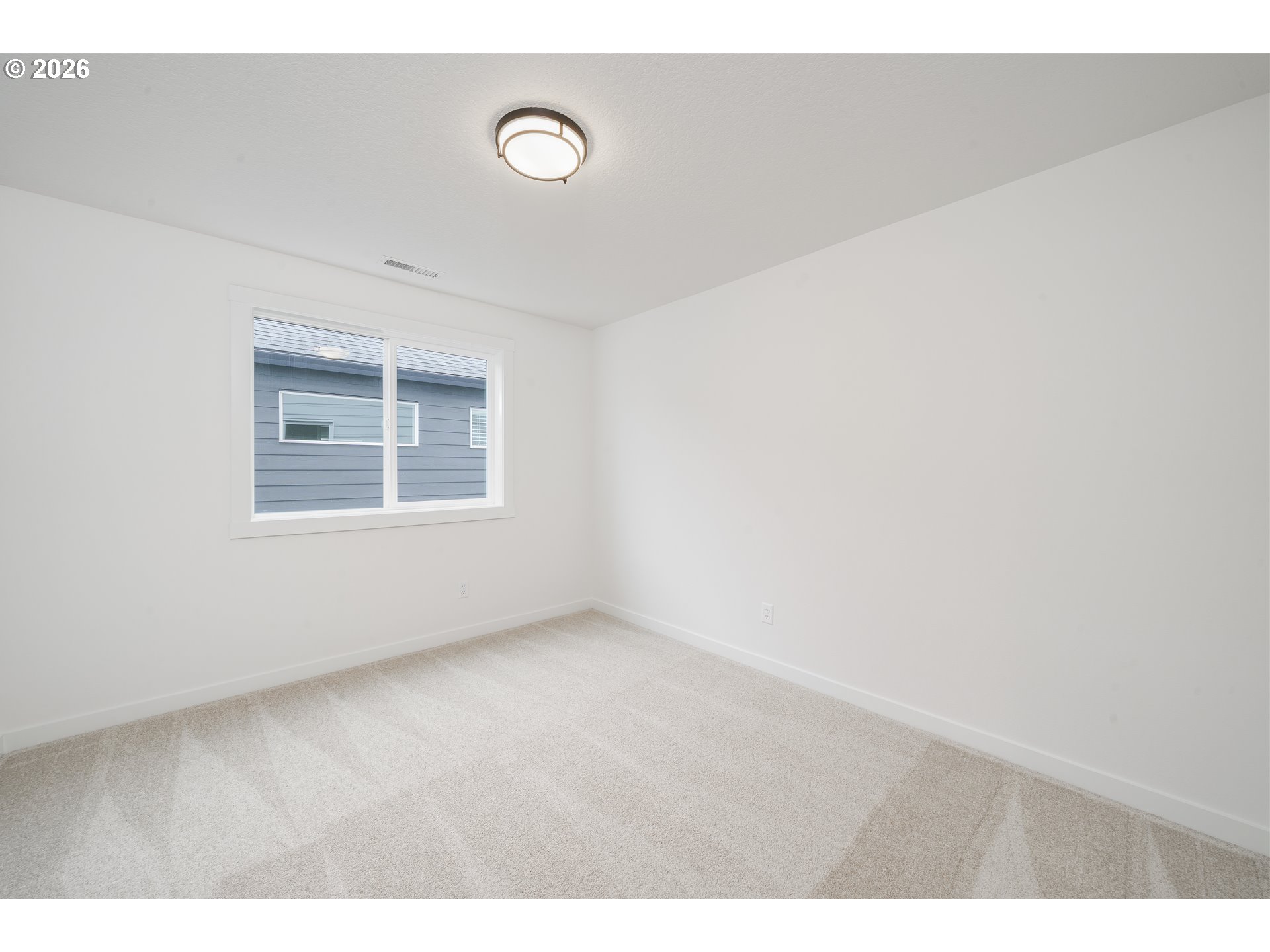 1908 Northwest 21st Circle Battle Ground, WA 98604 - Photo 26 of 40 a view of an empty room with a window