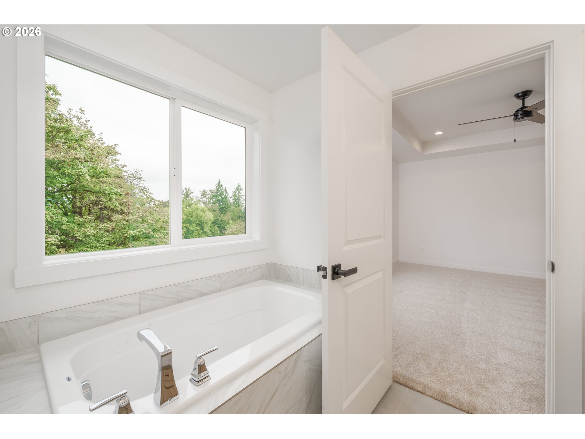 1908 Northwest 21st Circle Battle Ground, WA 98604 - Photo 33 of 40 a bathroom with a bathtub and a shower