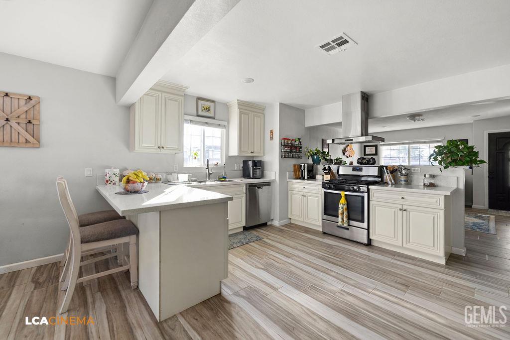 Undisclosed Address Wasco, CA 93280 - Photo 24 of 26 a kitchen with a sink appliances cabinets and furniture