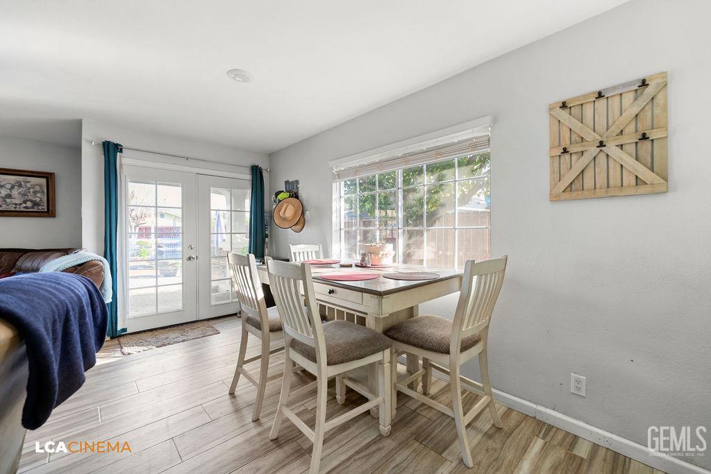 Undisclosed Address Wasco, CA 93280 - Photo 3 of 26 a view of a dining room with furniture window and outside view