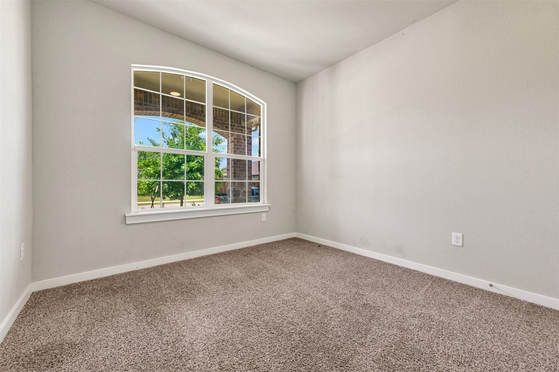 2016 Bobtail Pass Leander, TX 78641 - Photo 23 of 40 an empty room with a window