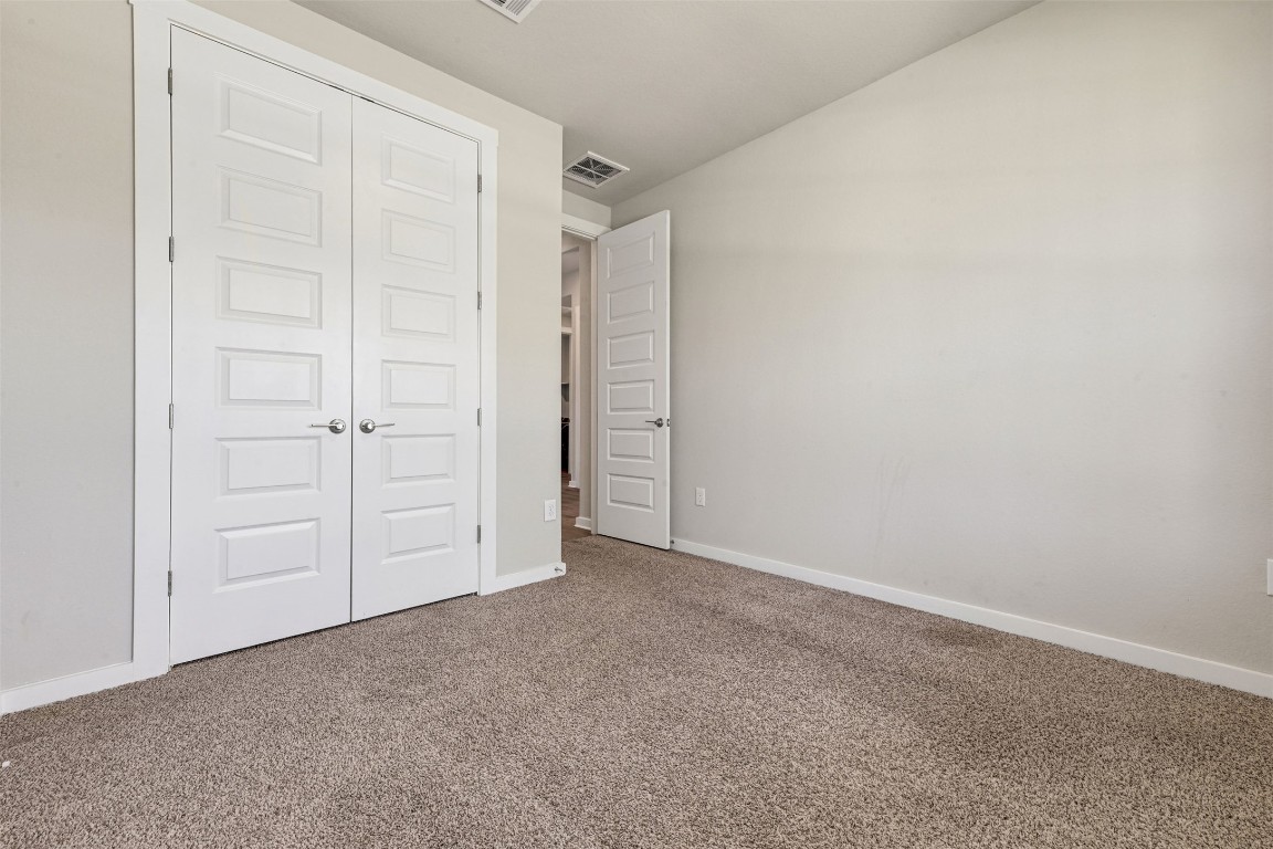 2016 Bobtail Pass Leander, TX 78641 - Photo 24 of 40 an empty room with closet area