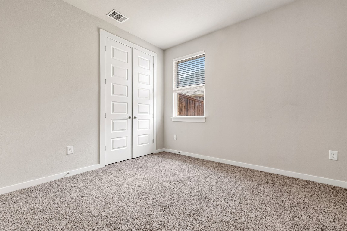 2016 Bobtail Pass Leander, TX 78641 - Photo 25 of 40 an empty room with windows