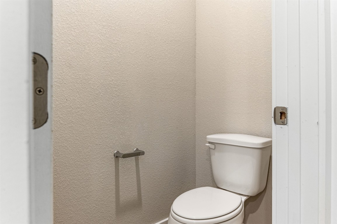 2016 Bobtail Pass Leander, TX 78641 - Photo 29 of 40 a white toilet sitting next to a shower