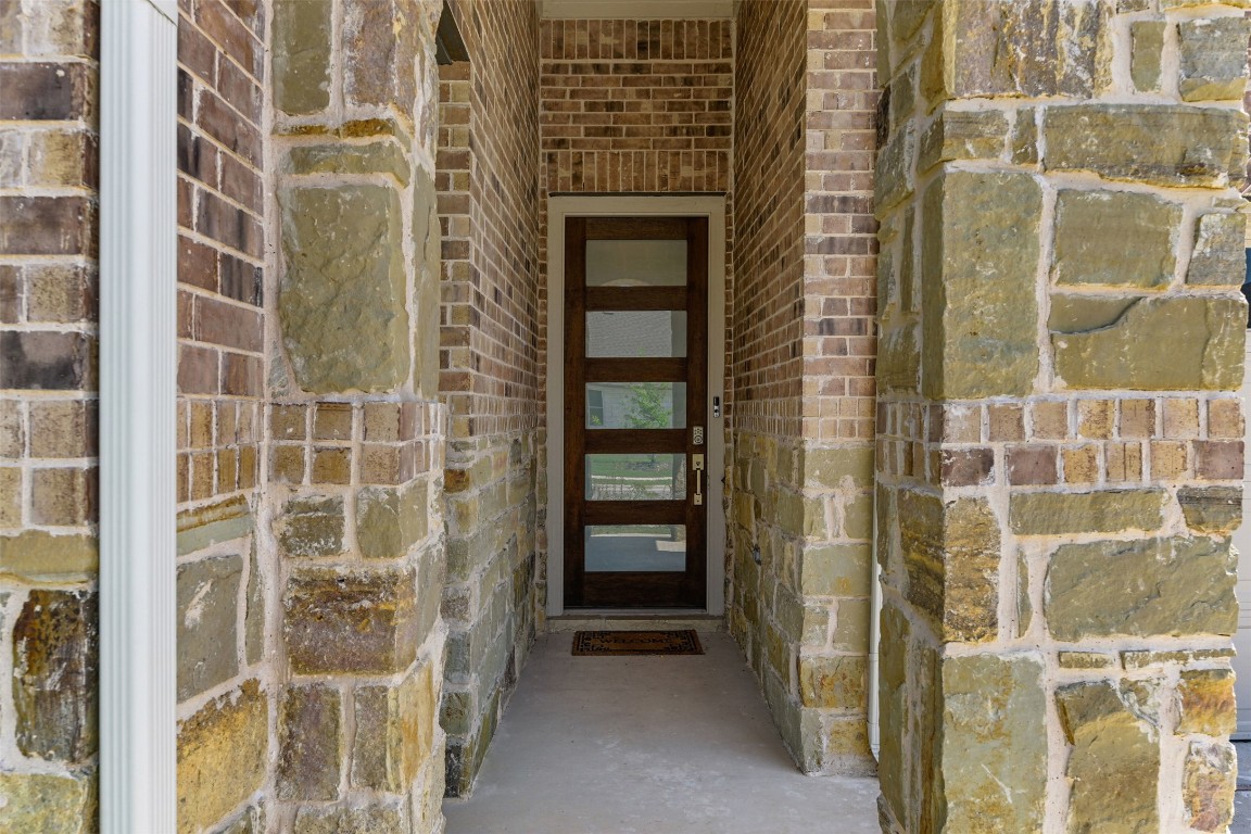2016 Bobtail Pass Leander, TX 78641 - Photo 3 of 40 a view of a glass door with a glass door