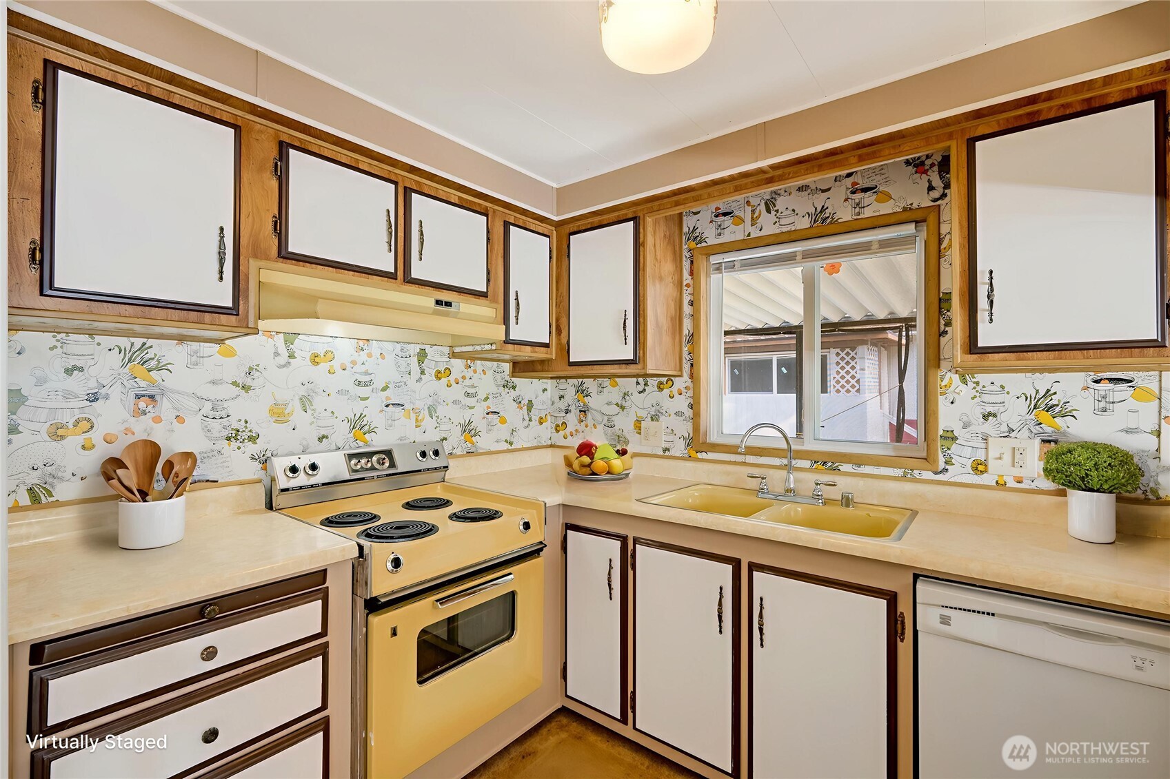 920 Maple Street, Unit 18 Sedro-Woolley, WA 98284 - Photo 13 of 32 a kitchen with stainless steel appliances a stove a sink and cabinets