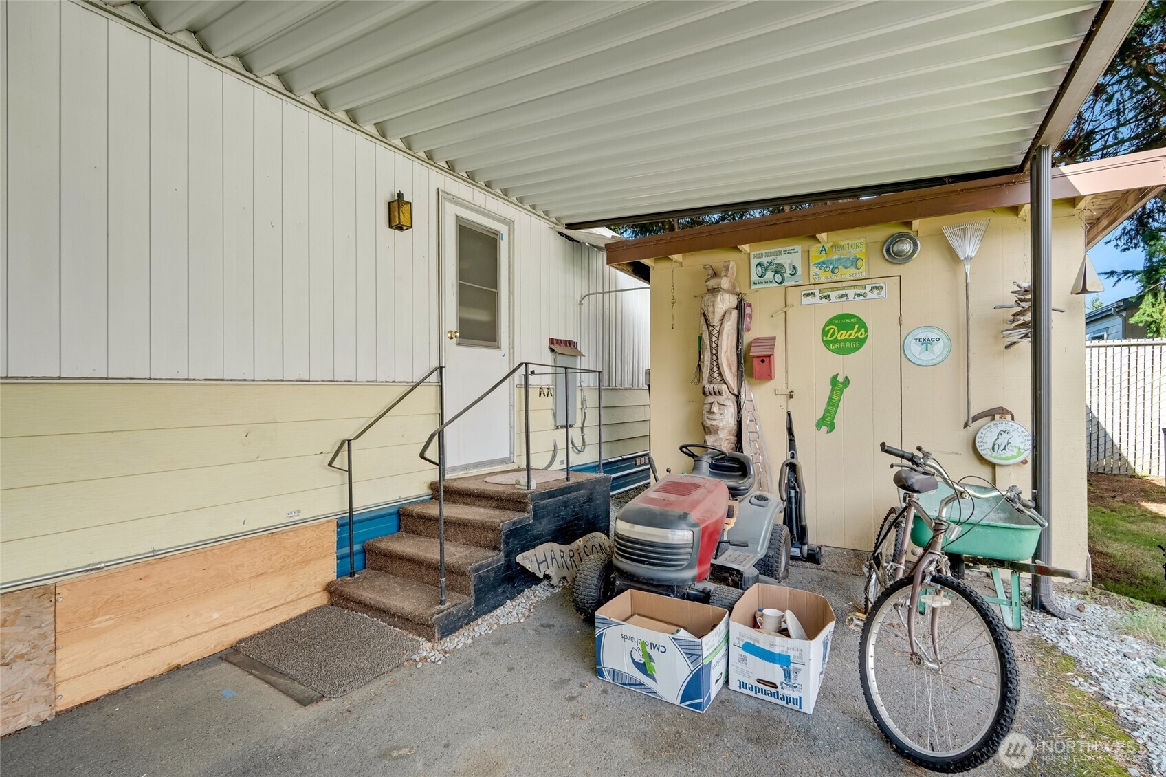 920 Maple Street, Unit 18 Sedro-Woolley, WA 98284 - Photo 27 of 32 a front view of a house with outdoor seating