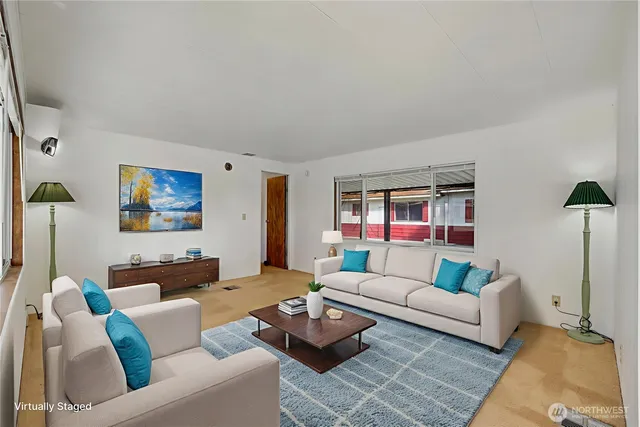 a living room with furniture and a couch