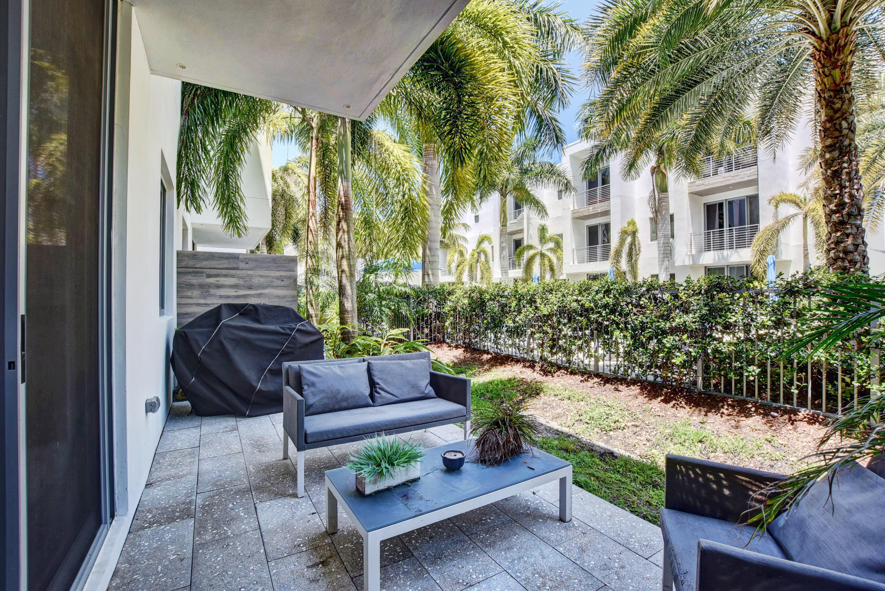 1721 Northwest 40th Drive Boca Raton, FL 33431 - Photo 47 of 49 GROUND LEVEL PATIO