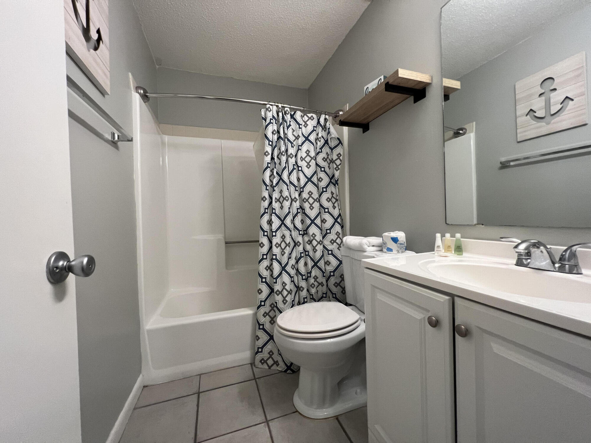 24 Blenheim Lane, Unit 7 Santa Rosa Beach, FL 32459 - Photo 9 of 11 a bathroom with a sink toilet and shower
