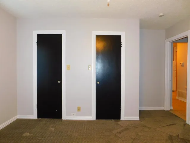 a bathroom with a sink a toilet a mirror and bathtub