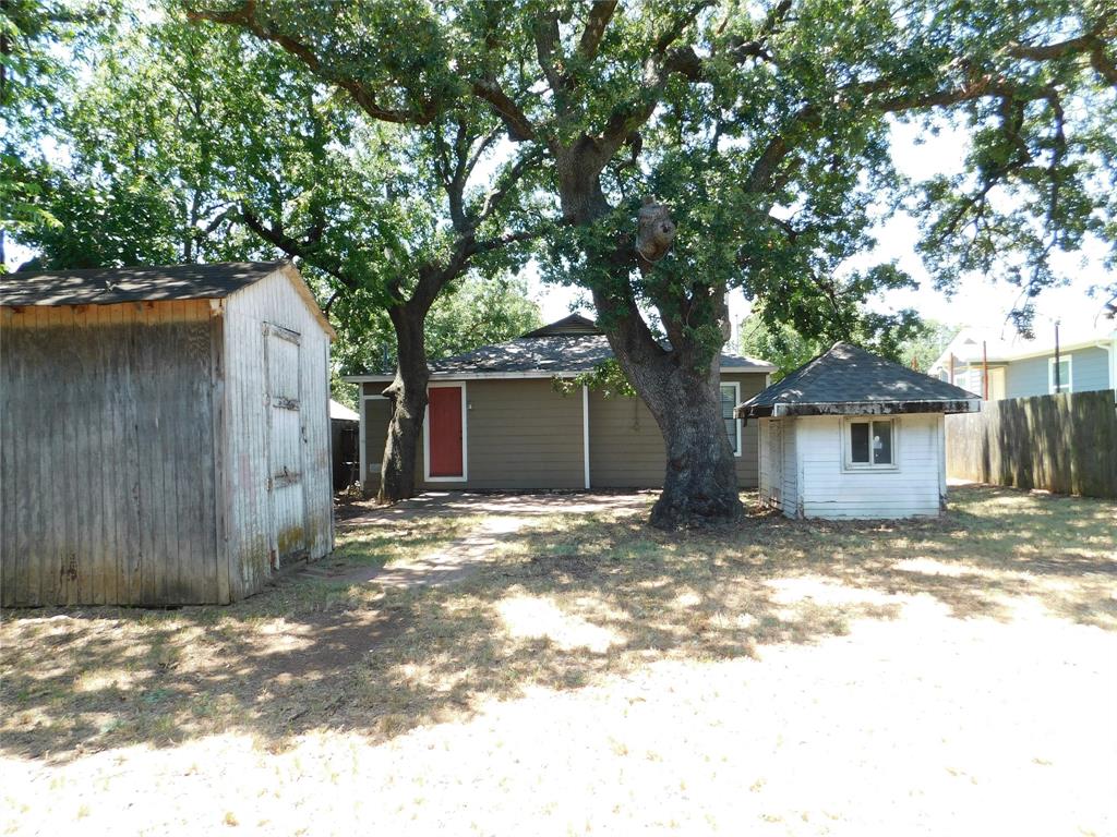 714 North Ruddell Street Denton, TX 76209 - Photo 20 of 20 a view of a house with a yard