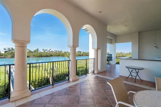 a view of a swimming pool with a patio