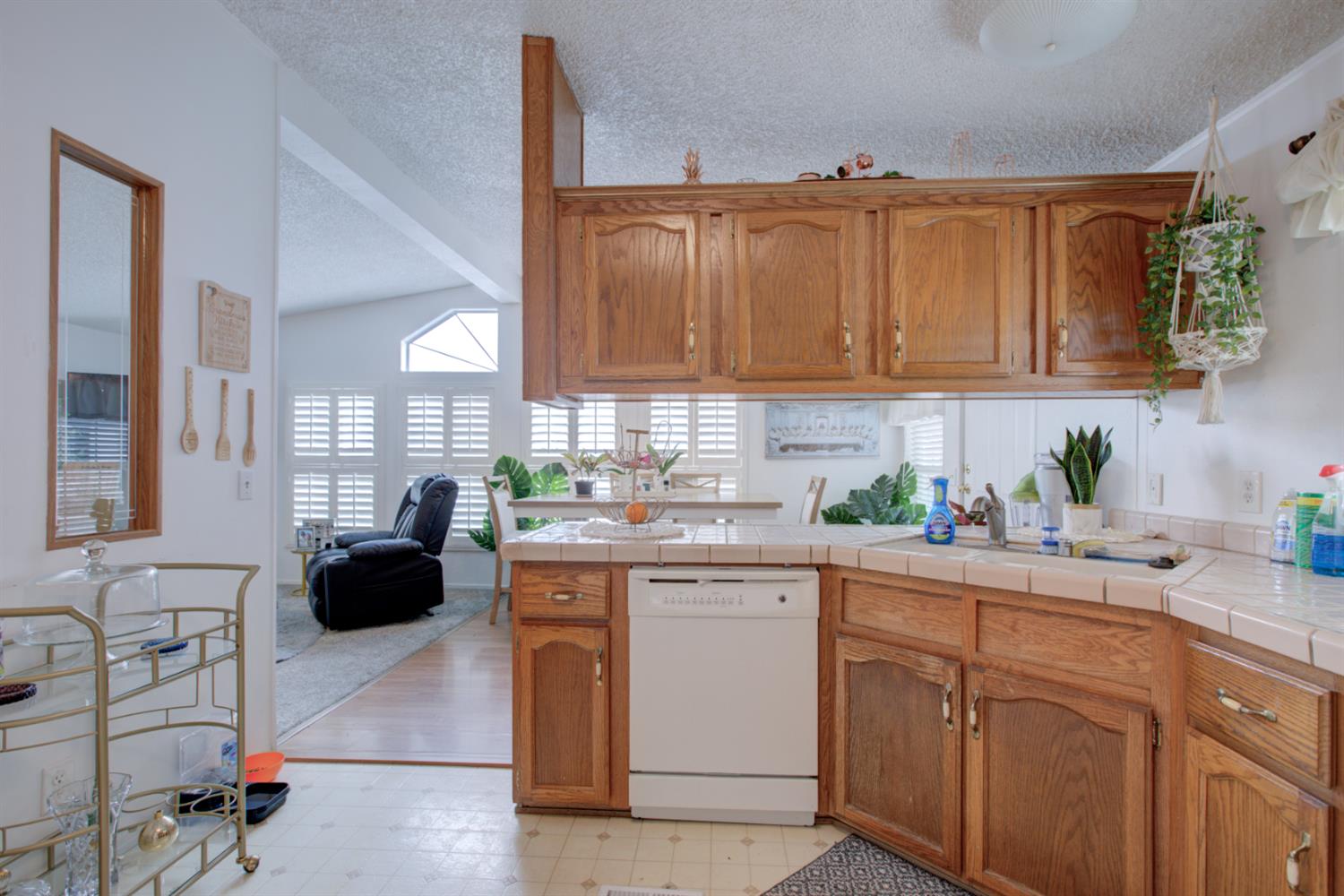 500 North Tully Road, Unit 64 Turlock, CA 95380 - Photo 28 of 38 a kitchen with a sink cabinets and window