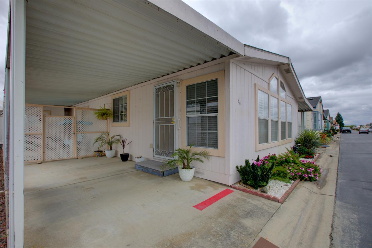 500 North Tully Road, Unit 64 Turlock, CA 95380 - Photo 29 of 38 a view of a house with porch