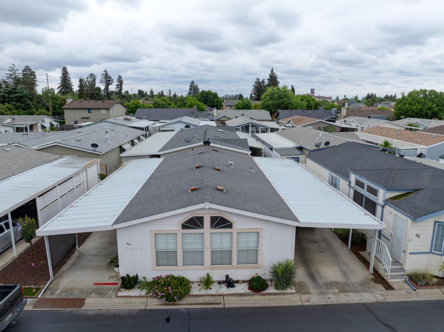 500 North Tully Road, Unit 64 Turlock, CA 95380 - Photo 35 of 38 an aerial view of multiple houses with yard
