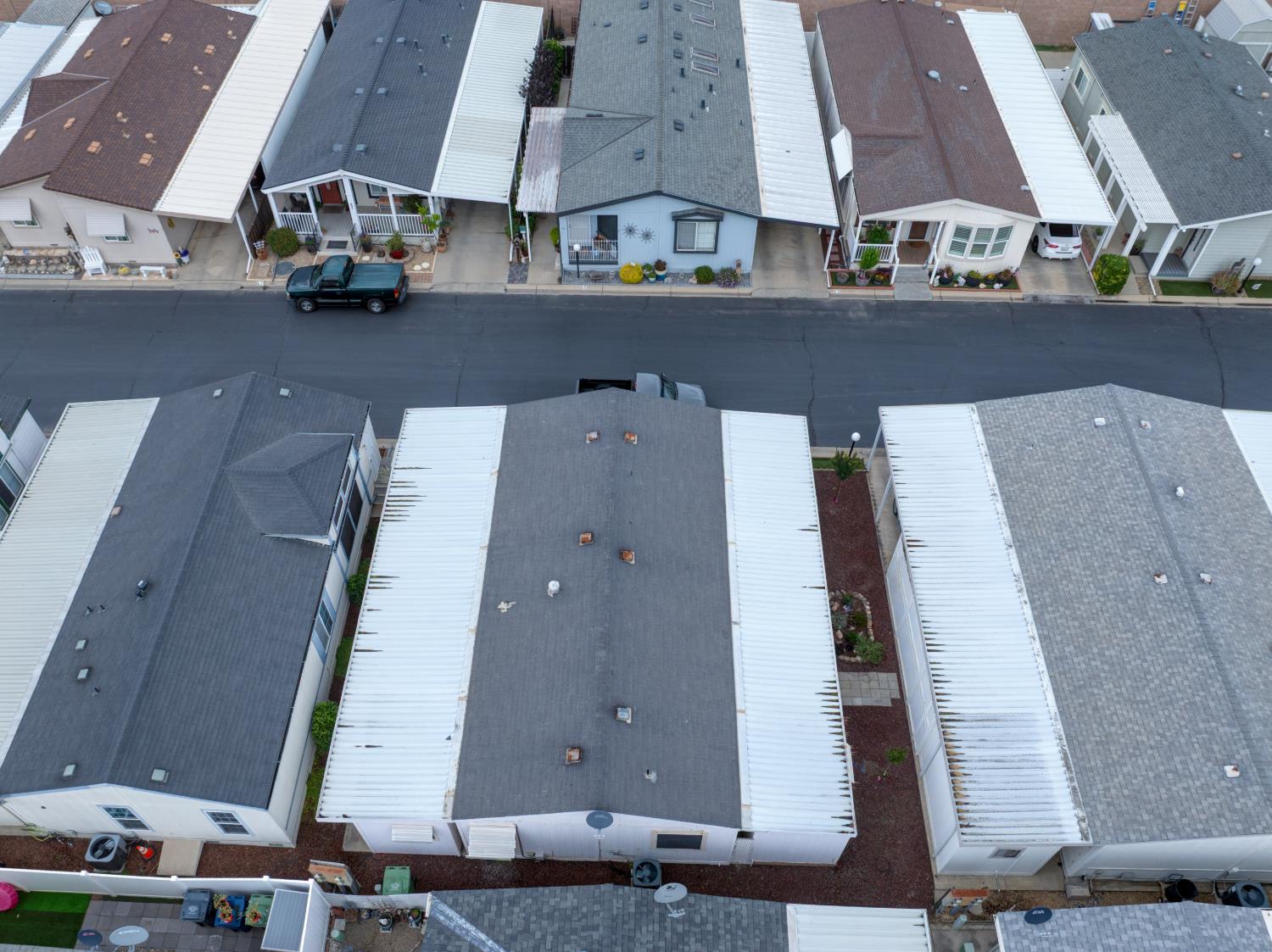 500 North Tully Road, Unit 64 Turlock, CA 95380 - Photo 36 of 38 an aerial view of residential houses and car parked
