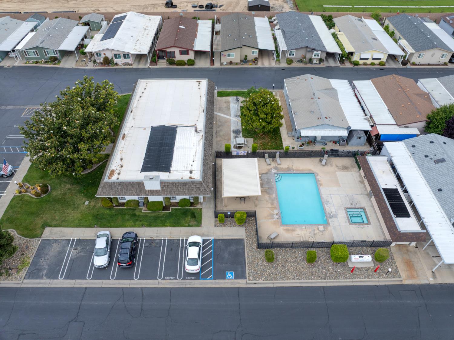 500 North Tully Road, Unit 64 Turlock, CA 95380 - Photo 38 of 38 an aerial view of a house with a yard and lake view
