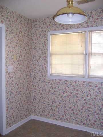 6712 Twin Tree Court Raleigh, NC 27613 - Photo 5 of 9 a bathroom with a window