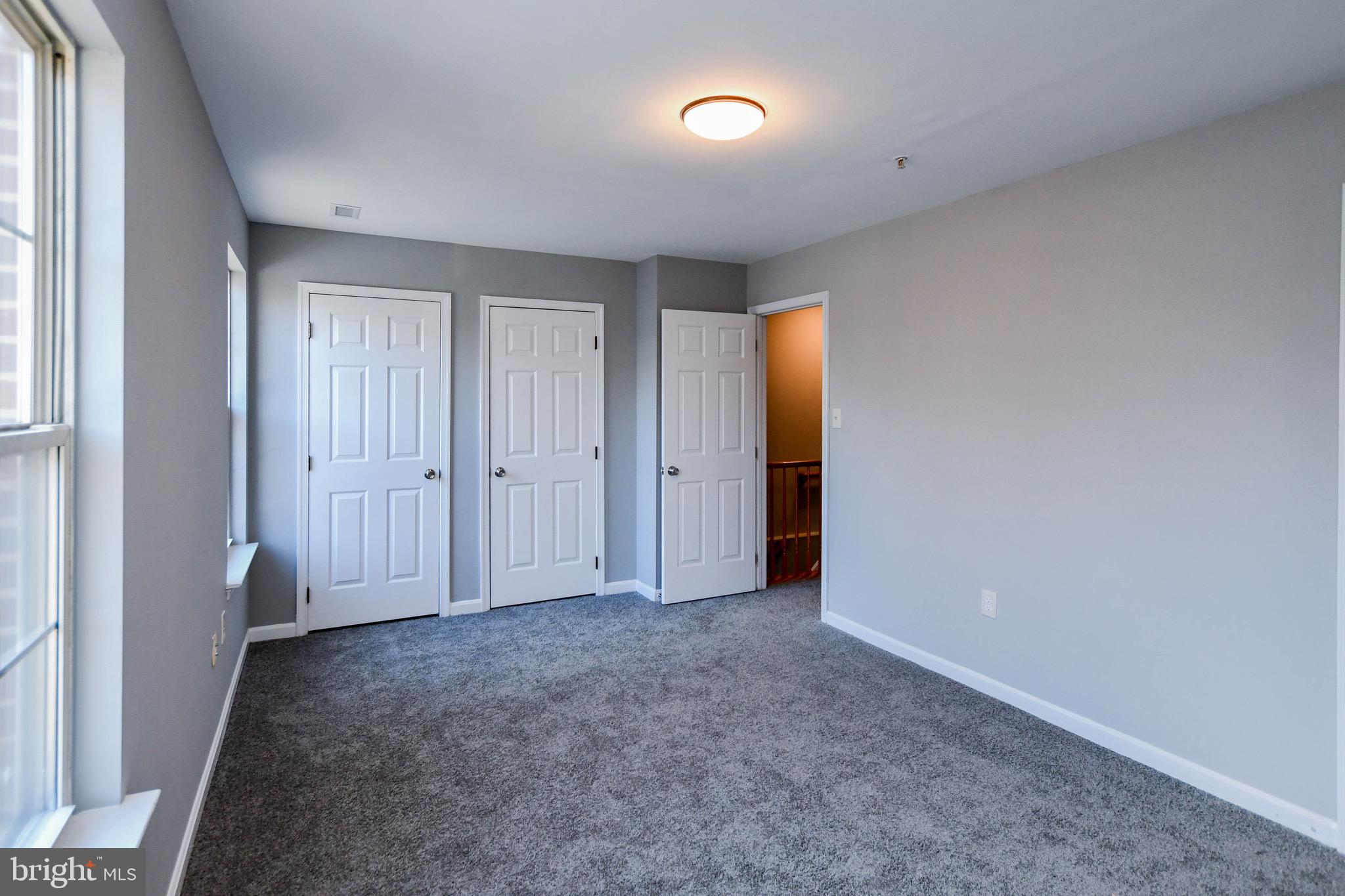 8802 Ritchboro Road District Heights, MD 20747 - Photo 29 of 66 an empty room with closet area