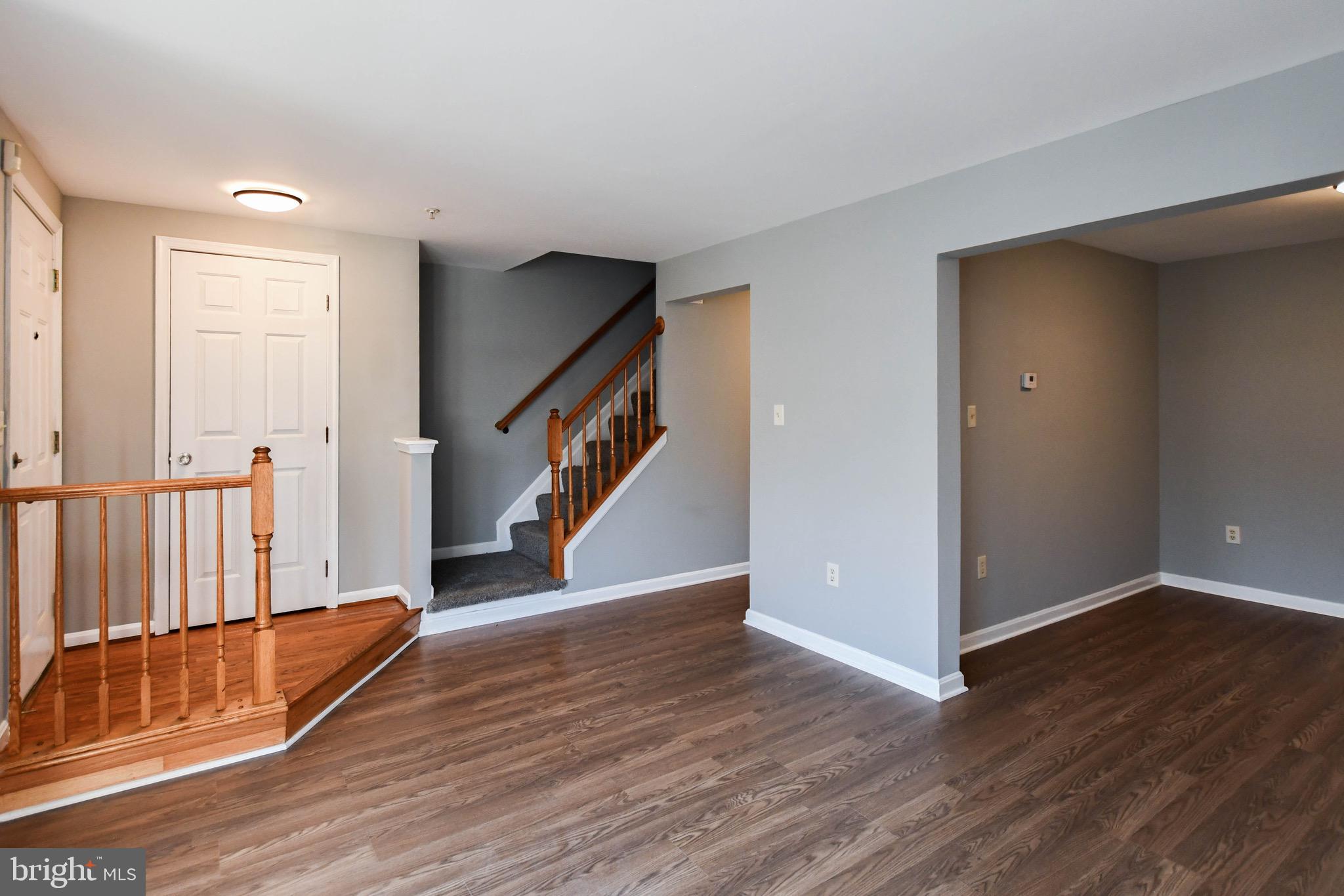 8802 Ritchboro Road District Heights, MD 20747 - Photo 10 of 66 an empty room with wooden floor and windows