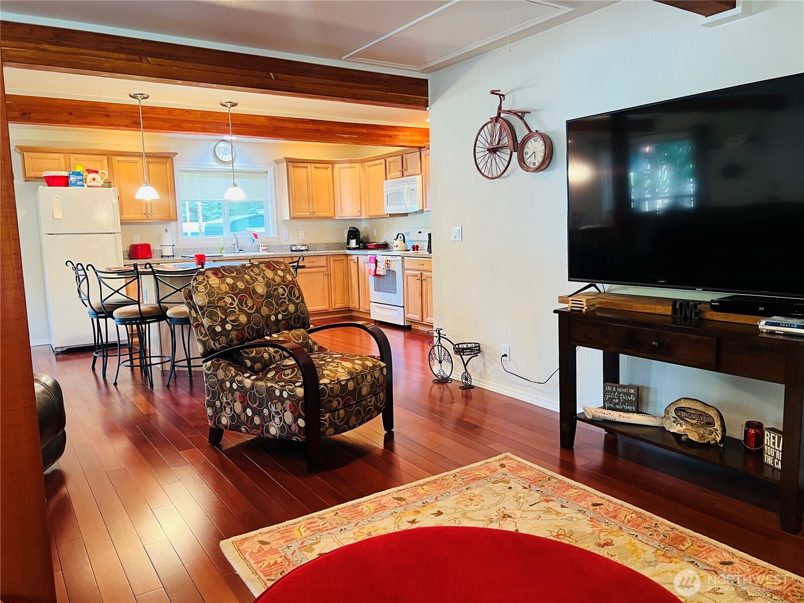 601 Mountain Trail Road Brinnon, WA 98320 - Photo 13 of 30 a living room with furniture and a flat screen tv