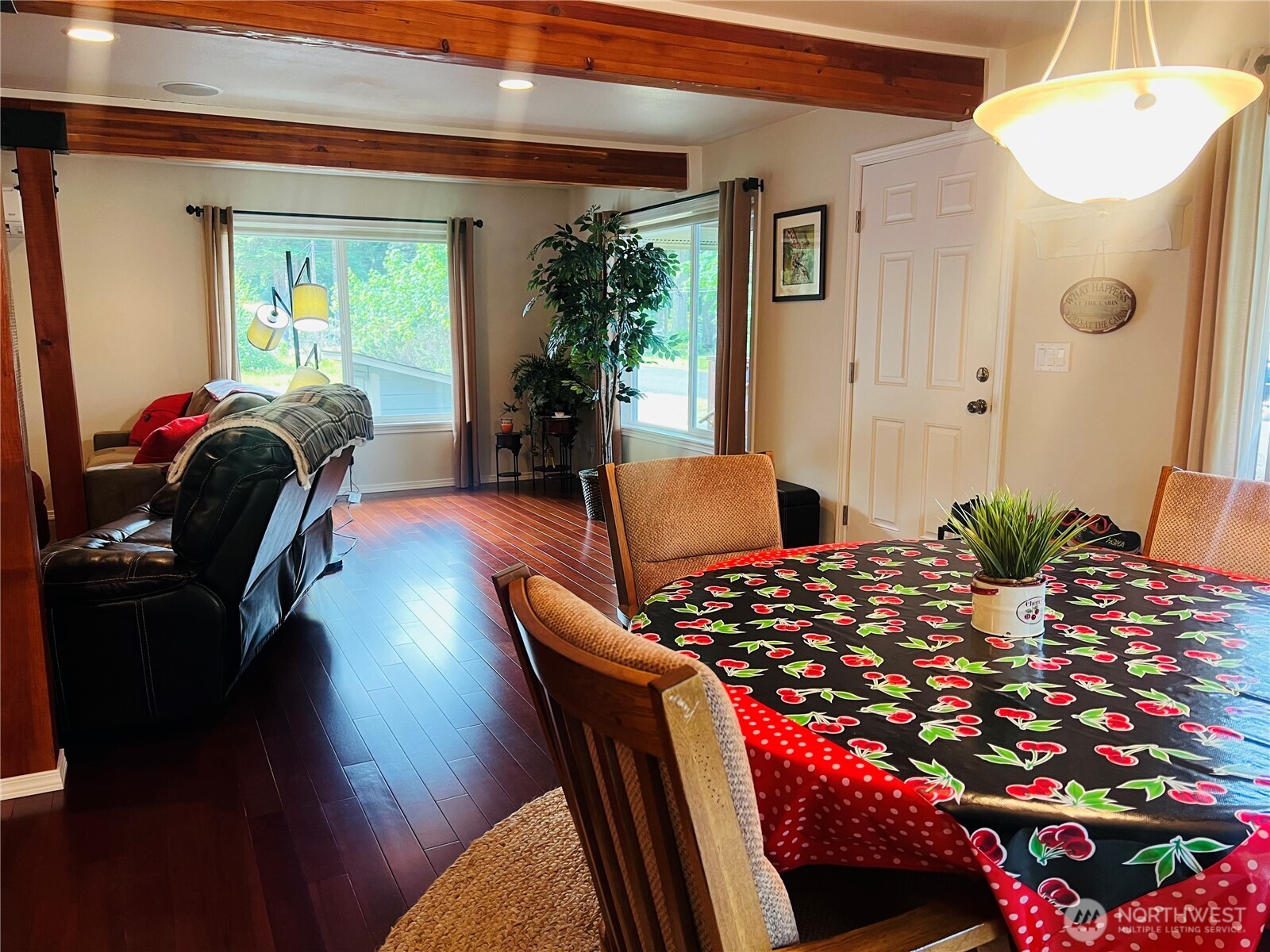 601 Mountain Trail Road Brinnon, WA 98320 - Photo 14 of 30 a living room with furniture and a floor to ceiling window