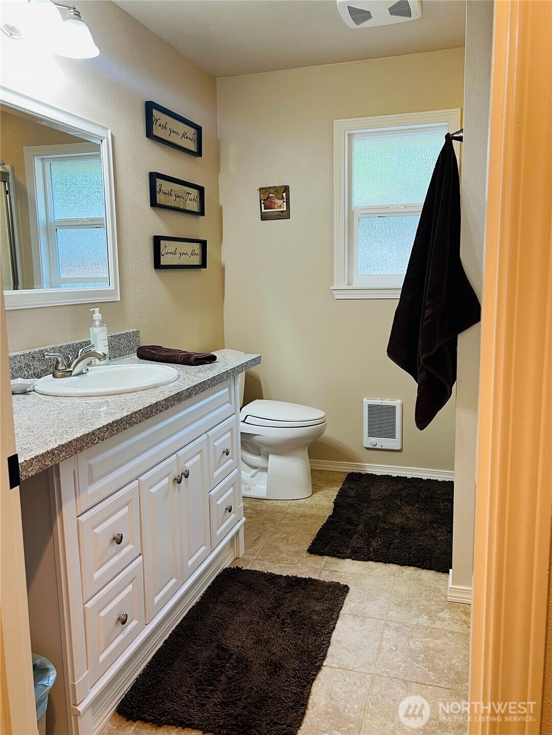 601 Mountain Trail Road Brinnon, WA 98320 - Photo 17 of 30 a bathroom with a sink toilet and vanity