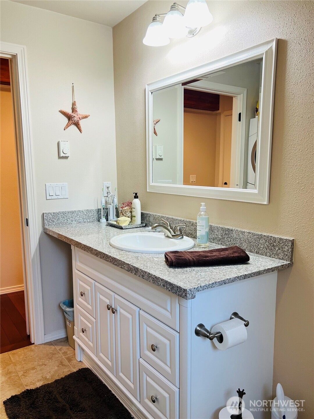 601 Mountain Trail Road Brinnon, WA 98320 - Photo 18 of 30 a bathroom with a sink and a mirror