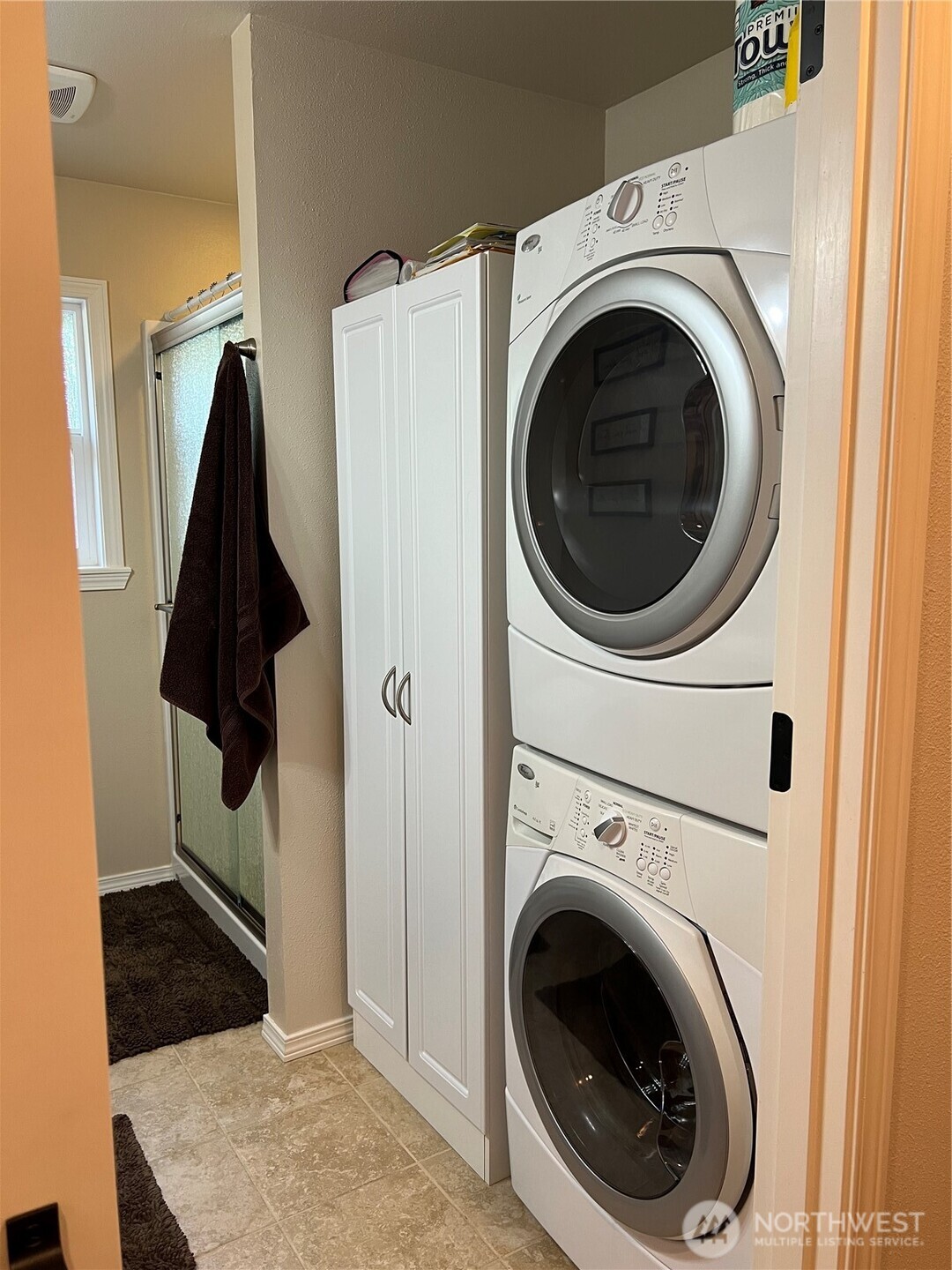 601 Mountain Trail Road Brinnon, WA 98320 - Photo 19 of 30 a view of a bedroom with washer and dryer