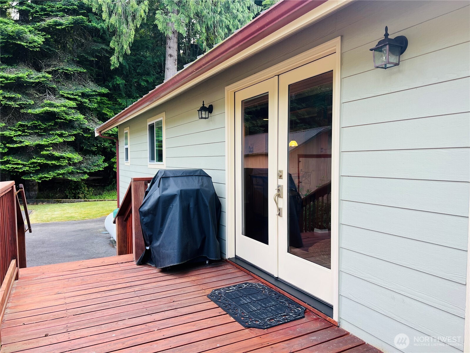 601 Mountain Trail Road Brinnon, WA 98320 - Photo 20 of 30 a view of backyard with hardwood and deck