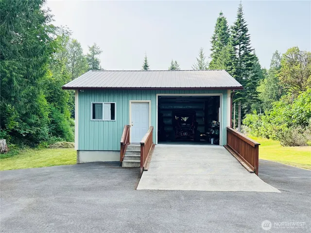 a view of outdoor space yard and garage