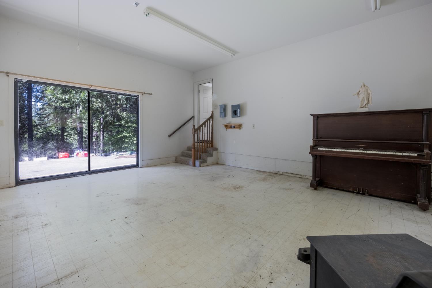 2070 King Of The Mountain Road Pollock Pines, CA 95726 - Photo 21 of 53 a view of a room with furniture and windows