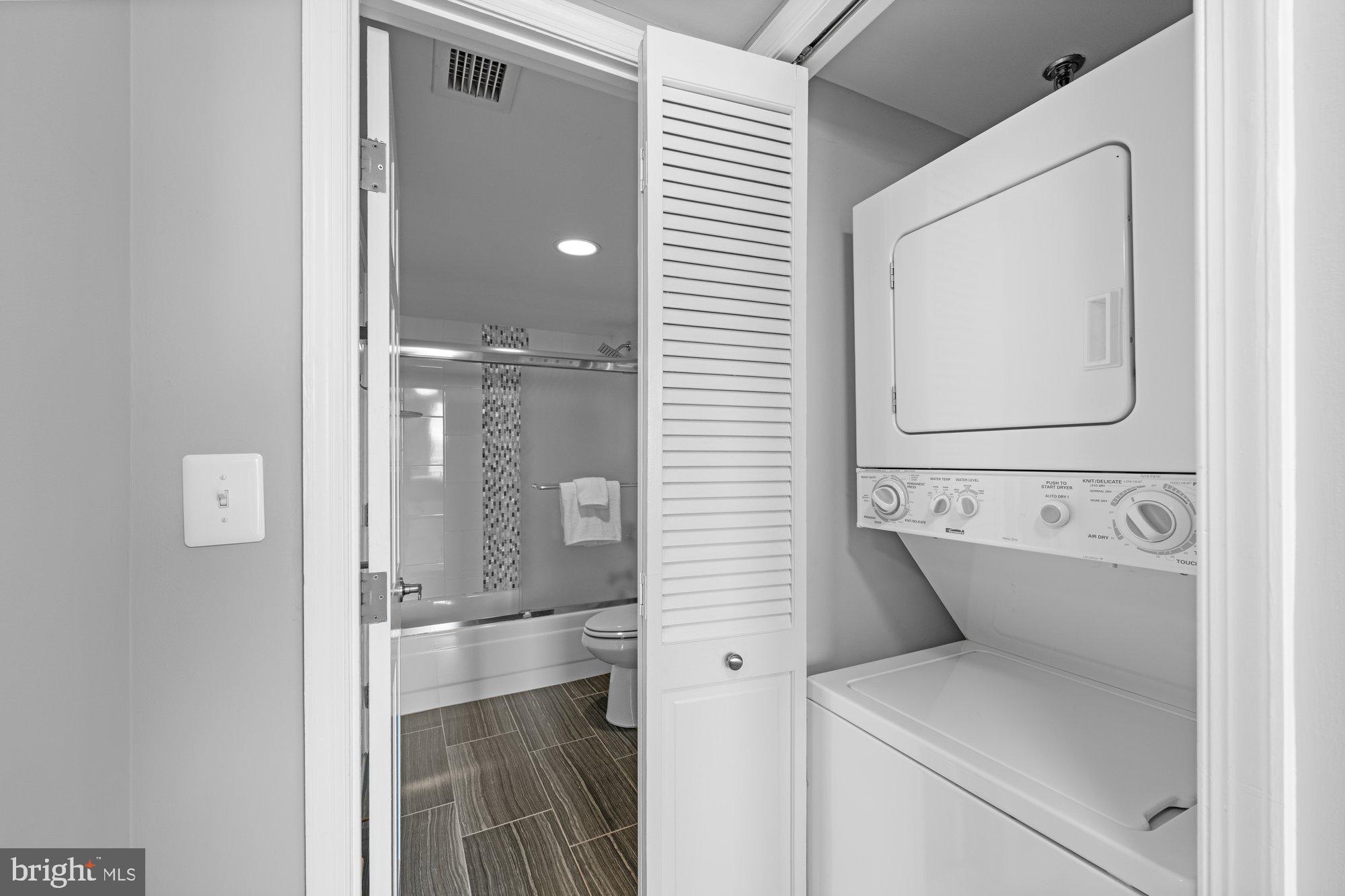 701 Pennsylvania Avenue Northwest, Unit PH2 Washington, DC 20004 - Photo 13 of 19 a bathroom with a sink and mirror