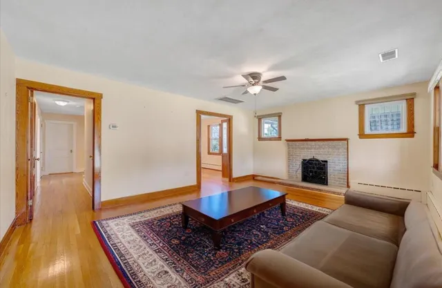 a large kitchen with stainless steel appliances granite countertop a stove and a sink