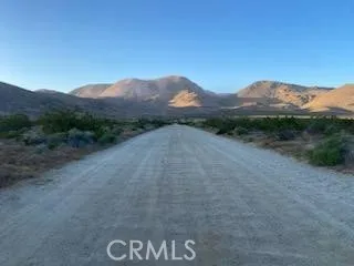 0 30th Mojave, CA 93501 - Photo 6 of 8 a view of a street with a mountain in the background