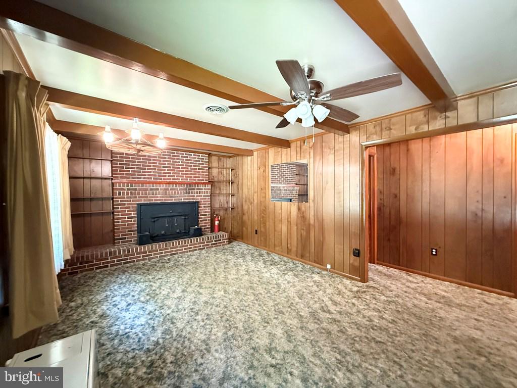 664 Sandy Point Road Heathsville, VA 22473 - Photo 11 of 12 Cozy living space with rustic charm.
