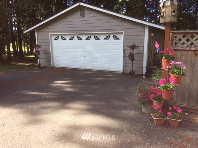 5314 133rd Avenue Southwest Rochester, WA 98579 - Photo 22 of 25 a front view of house with yard