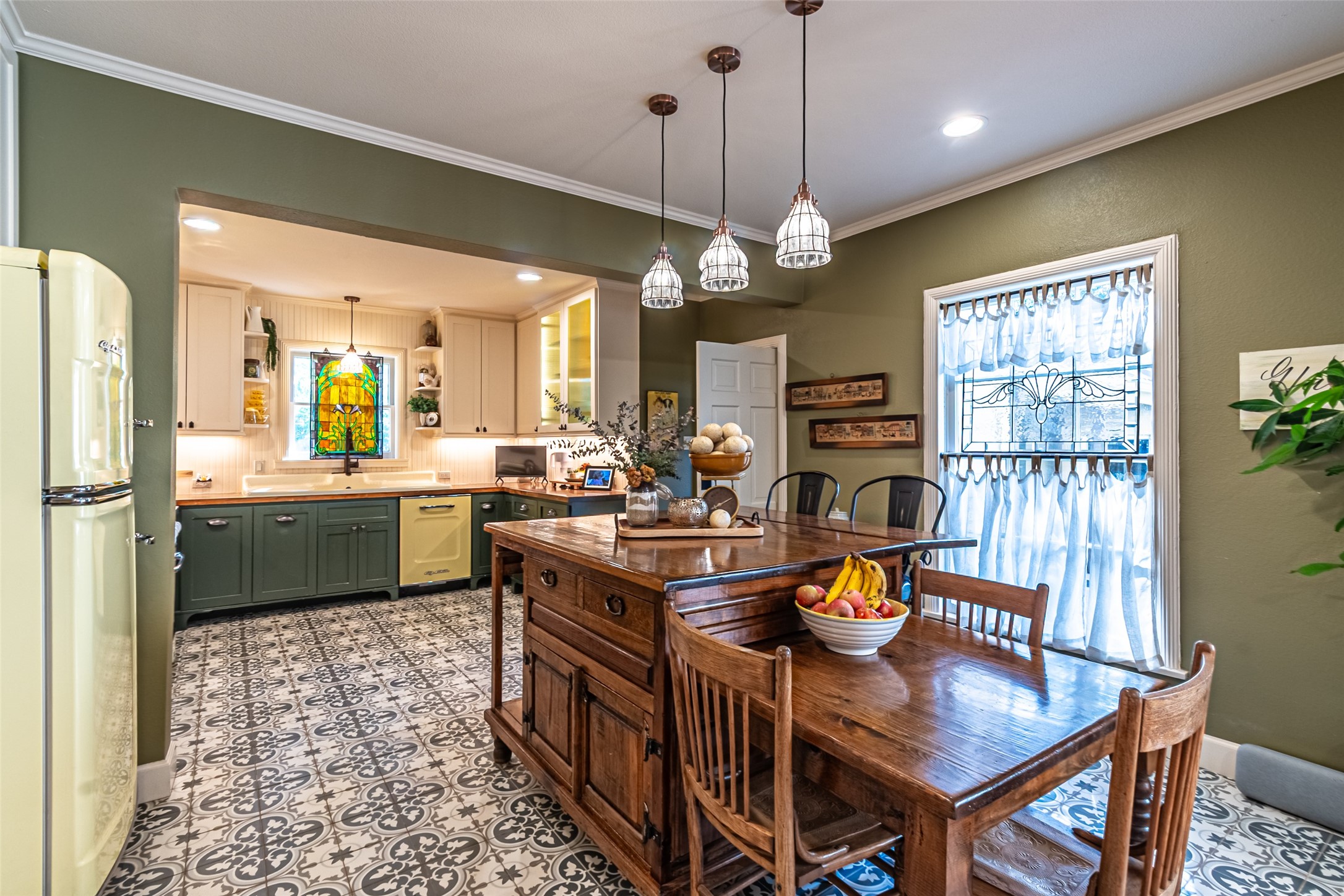 706 Church Street Navasota, TX 77868 - Photo 16 of 50 a open kitchen with stainless steel appliances granite countertop a stove refrigerator dining table and chairs