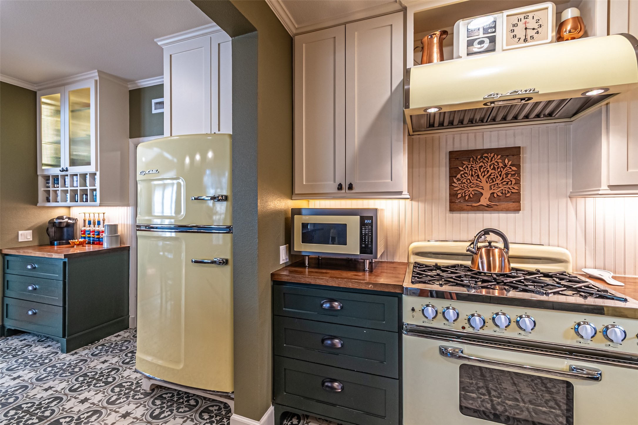 706 Church Street Navasota, TX 77868 - Photo 20 of 50 a kitchen with granite countertop a stove and a refrigerator