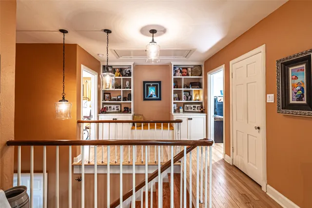 a living room with furniture ceiling fan and a window